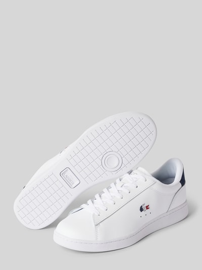 Peek & Cloppenburg LacosteLedersneaker mit Logo-Stitching Modell 'CARNABY' in weiss Vierteljährliche Förderung