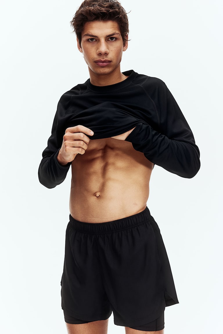 H&M Doppellagige Sportshorts mit DryMove™ Exklusive Angebote