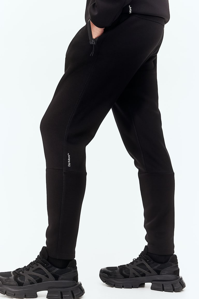 H&M Sport-Joggpants mit DryMove™ in Slim Fit Tiefpreis