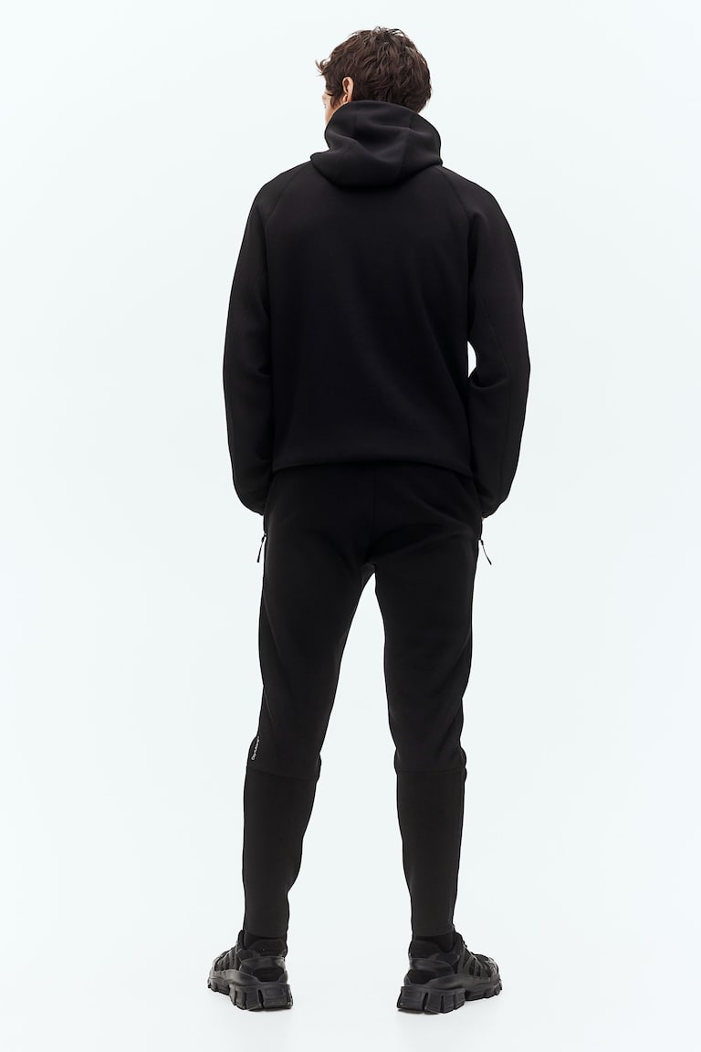 H&M Sport-Joggpants mit DryMove™ in Slim Fit Tiefpreis