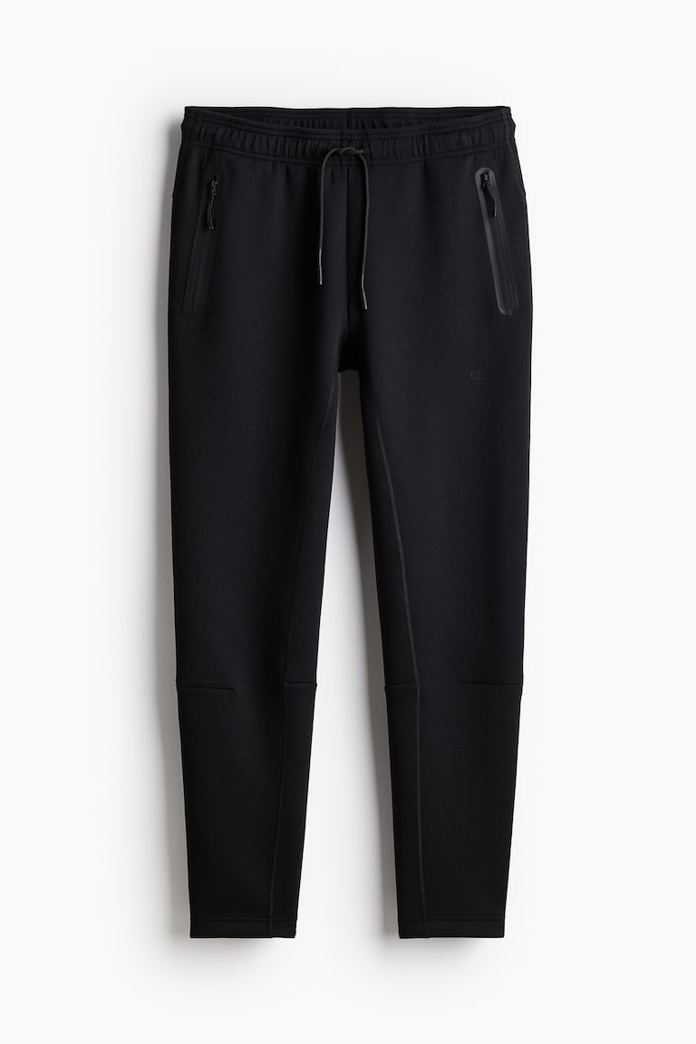 H&M Sport-Joggpants mit DryMove™ in Slim Fit Tiefpreis