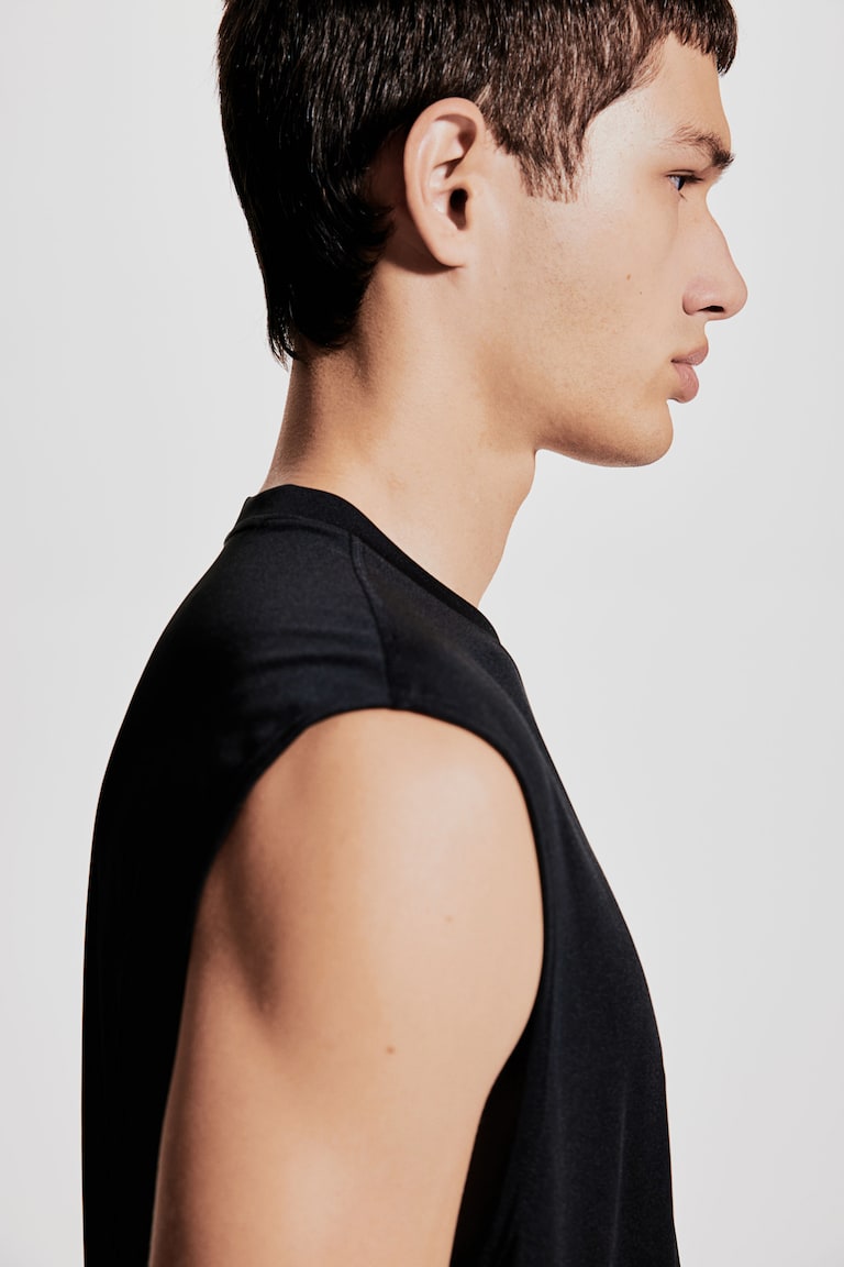 H&M Sport-Tanktop mit DryMove™ in Regular Fit Kostenlose Rückgabe
