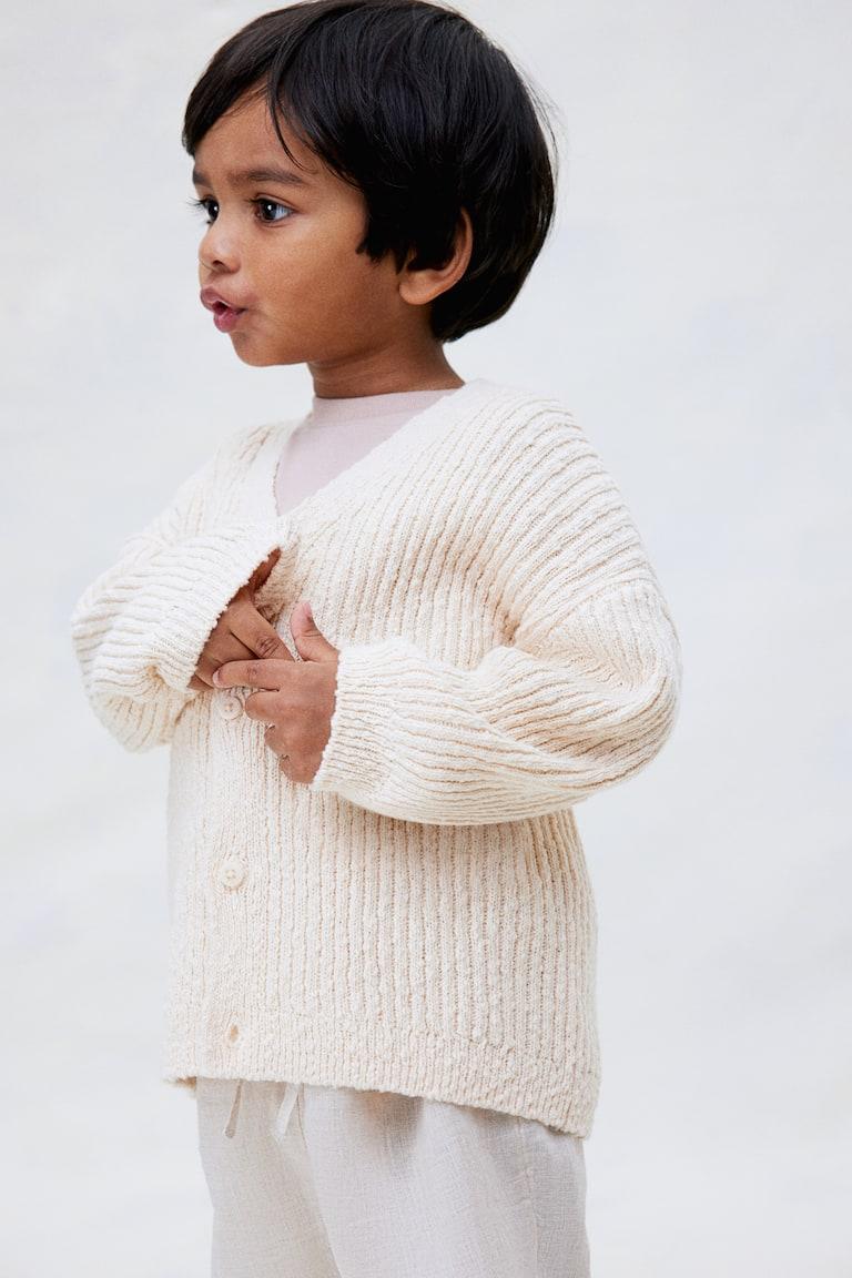 H&M Oversized Cardigan aus Boucléstrick Osterangebot