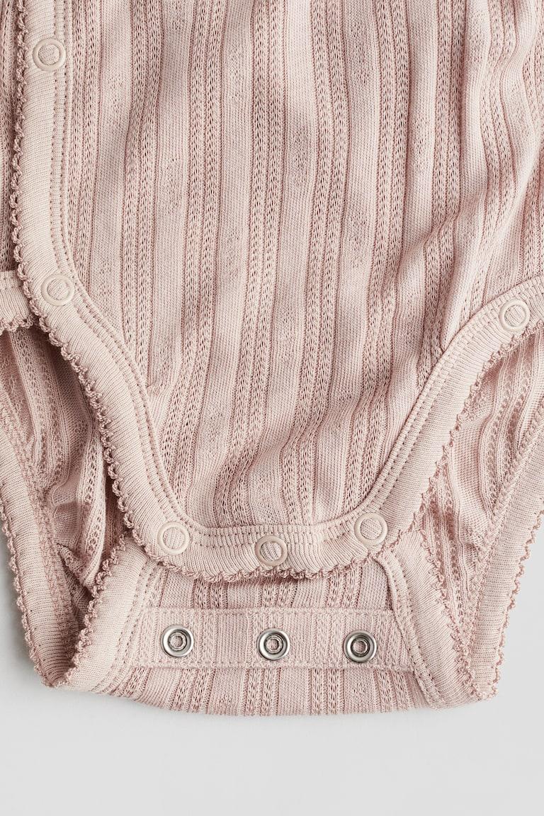 H&M Jerseybody mit Pointellemuster Jubiläumsangebot