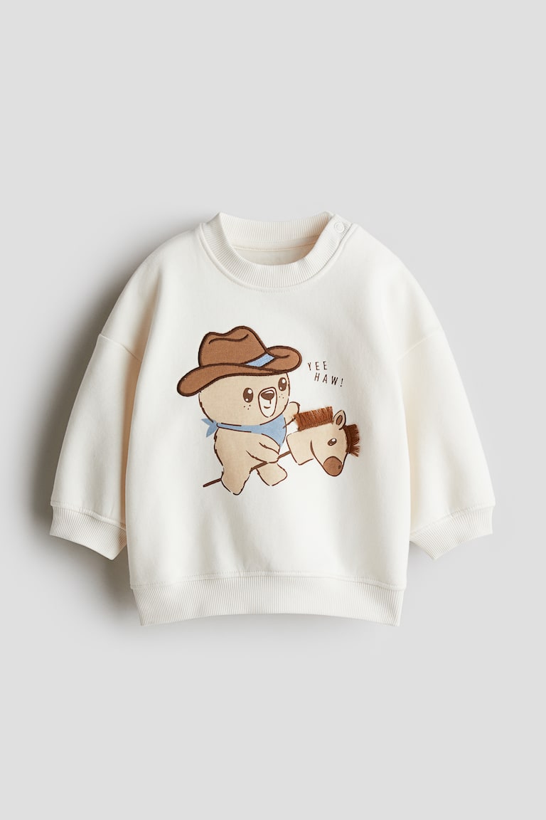 H&M Sweatshirt mit Motiv Clearance-Verkauf