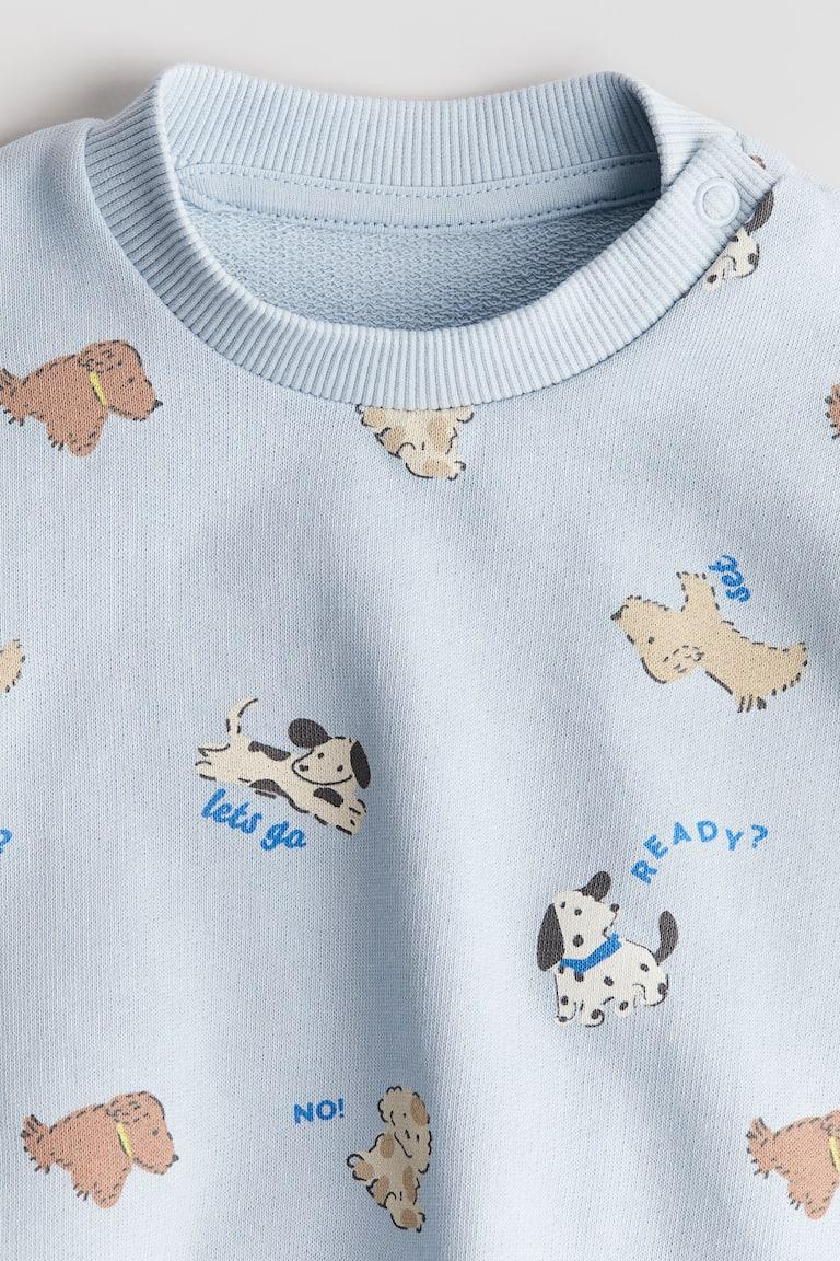 H&M Sweatshirt mit Print 2025