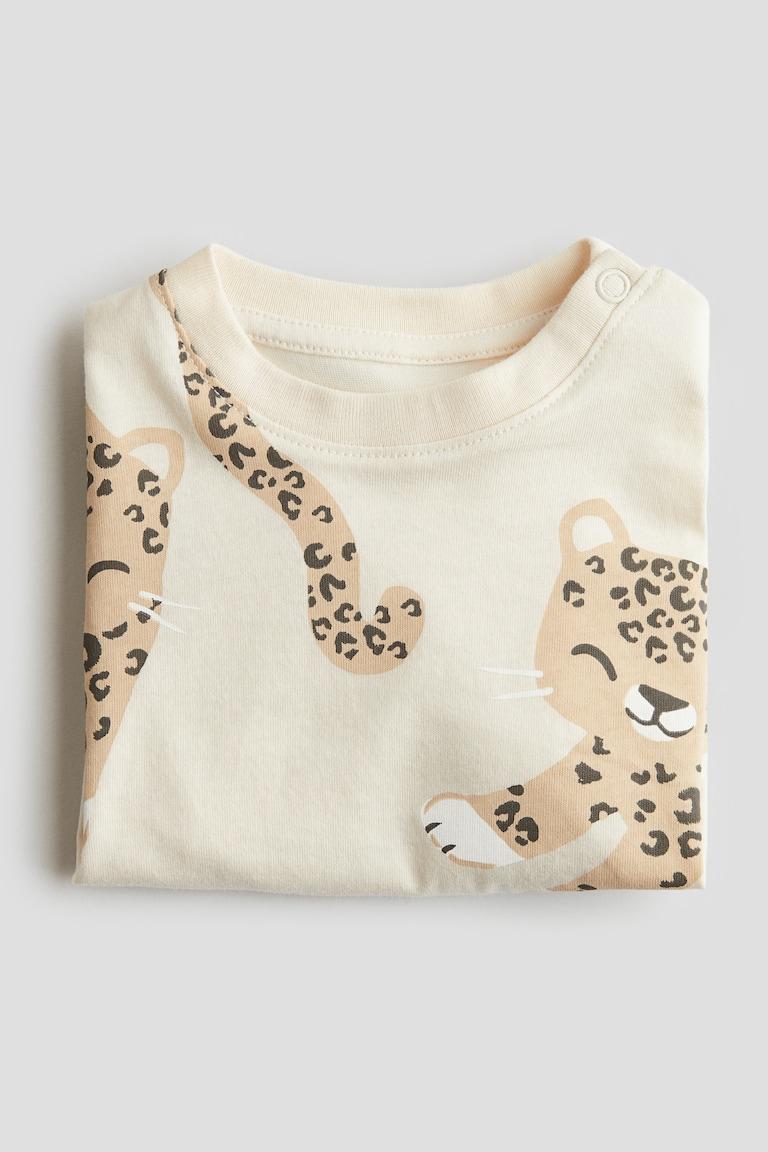 H&M Baumwoll-T-Shirt mit Print Auslauf