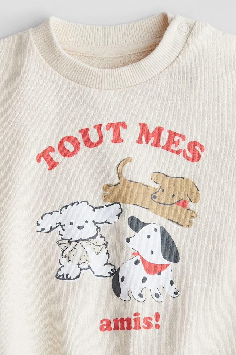 H&M Baumwollsweatshirt mit Print Kostenloser Versand