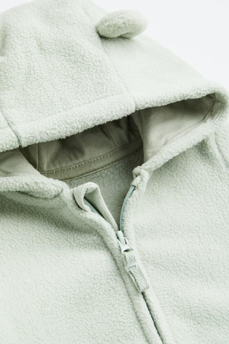 H&M Fleece-Overall mit Kapuze Große Rabatte