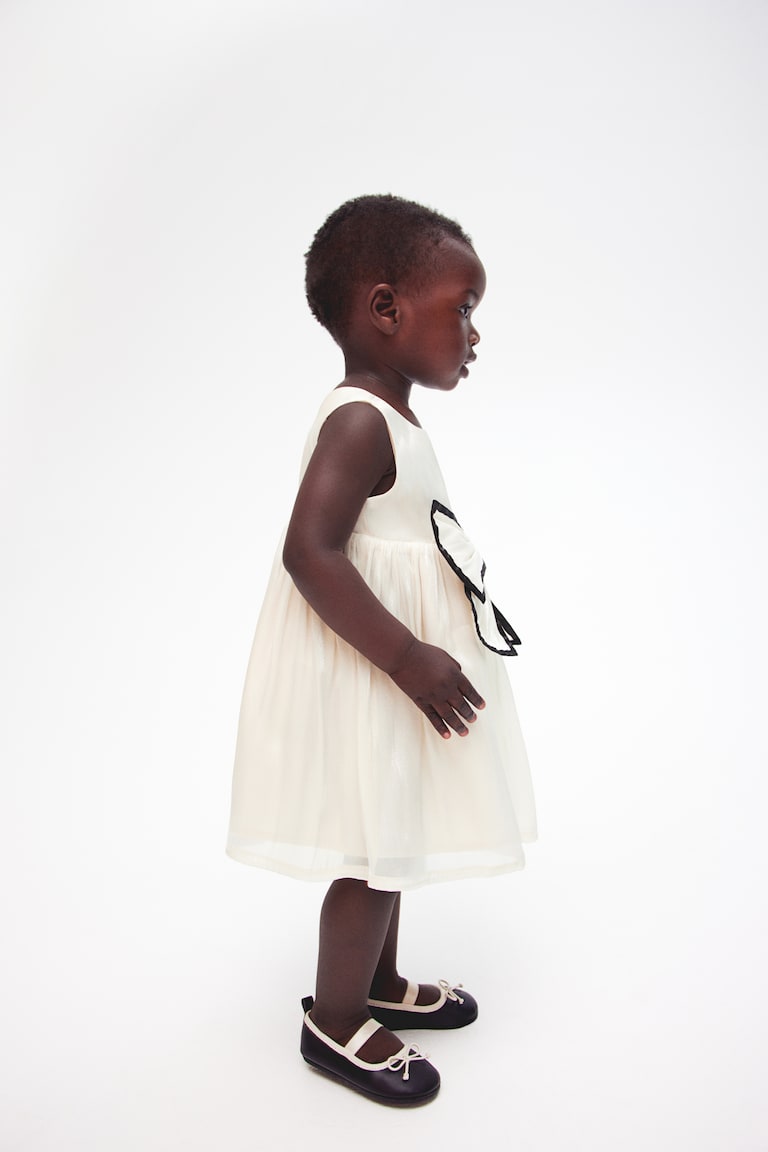 H&M Organza-Kleid mit Schleifendetail Begrenzt auf 3 Tage