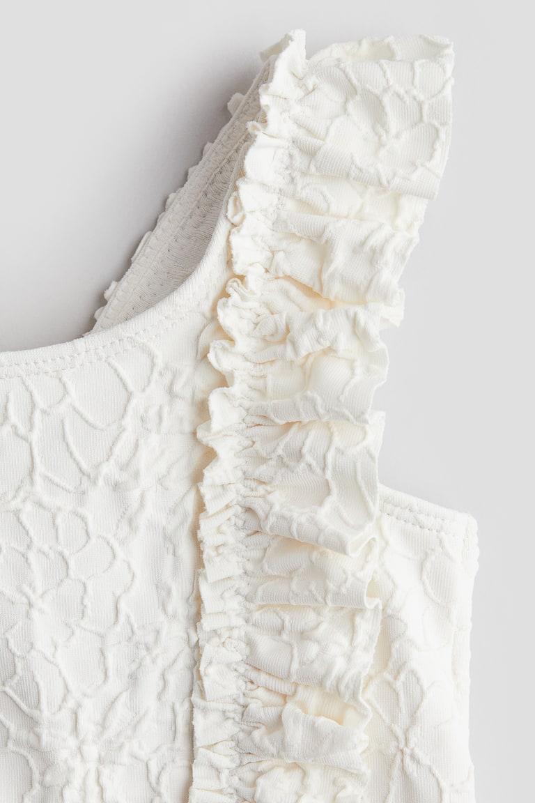 H&M Badeanzug mit Volants Fabrikpreis