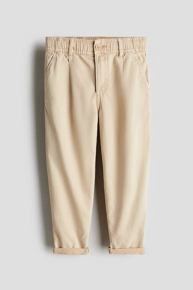 H&M Loose-fit tapered twill chinos Muttertagsangebot