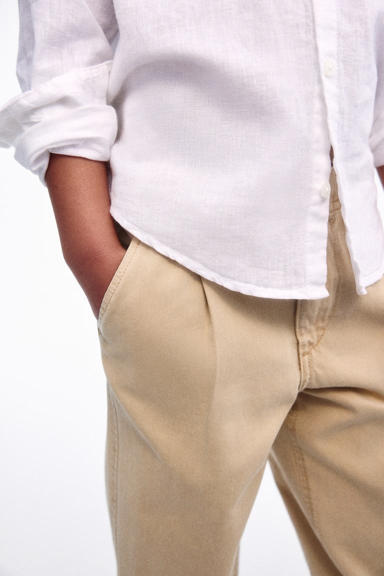 H&M Loose-fit tapered twill chinos Valentinstagsangebot