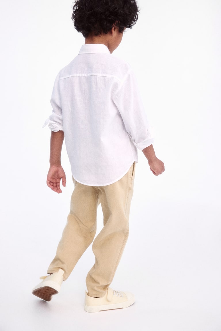 H&M Loose-fit tapered twill chinos Valentinstagsangebot