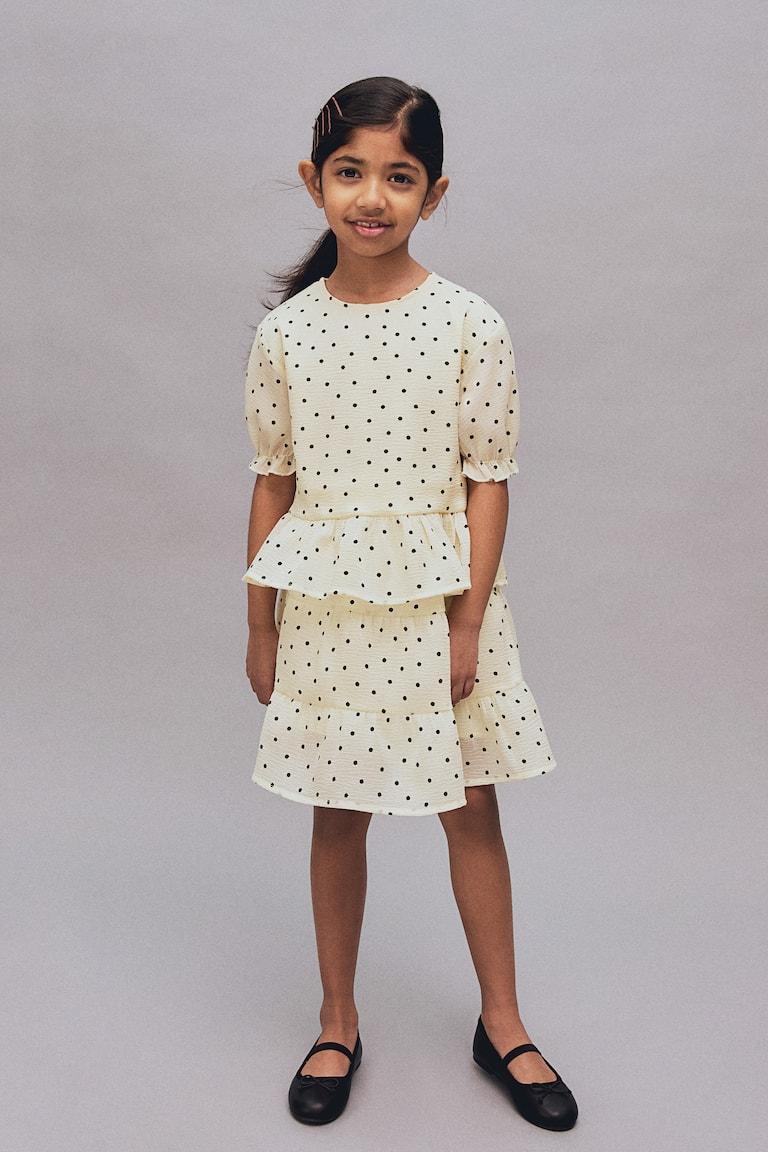 H&M Peplumbluse im Angebot