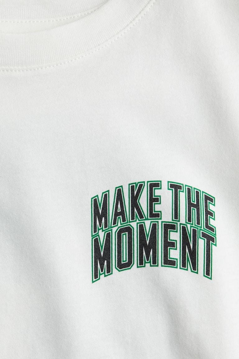 H&M T-Shirt mit Print Riesige Ersparnisse